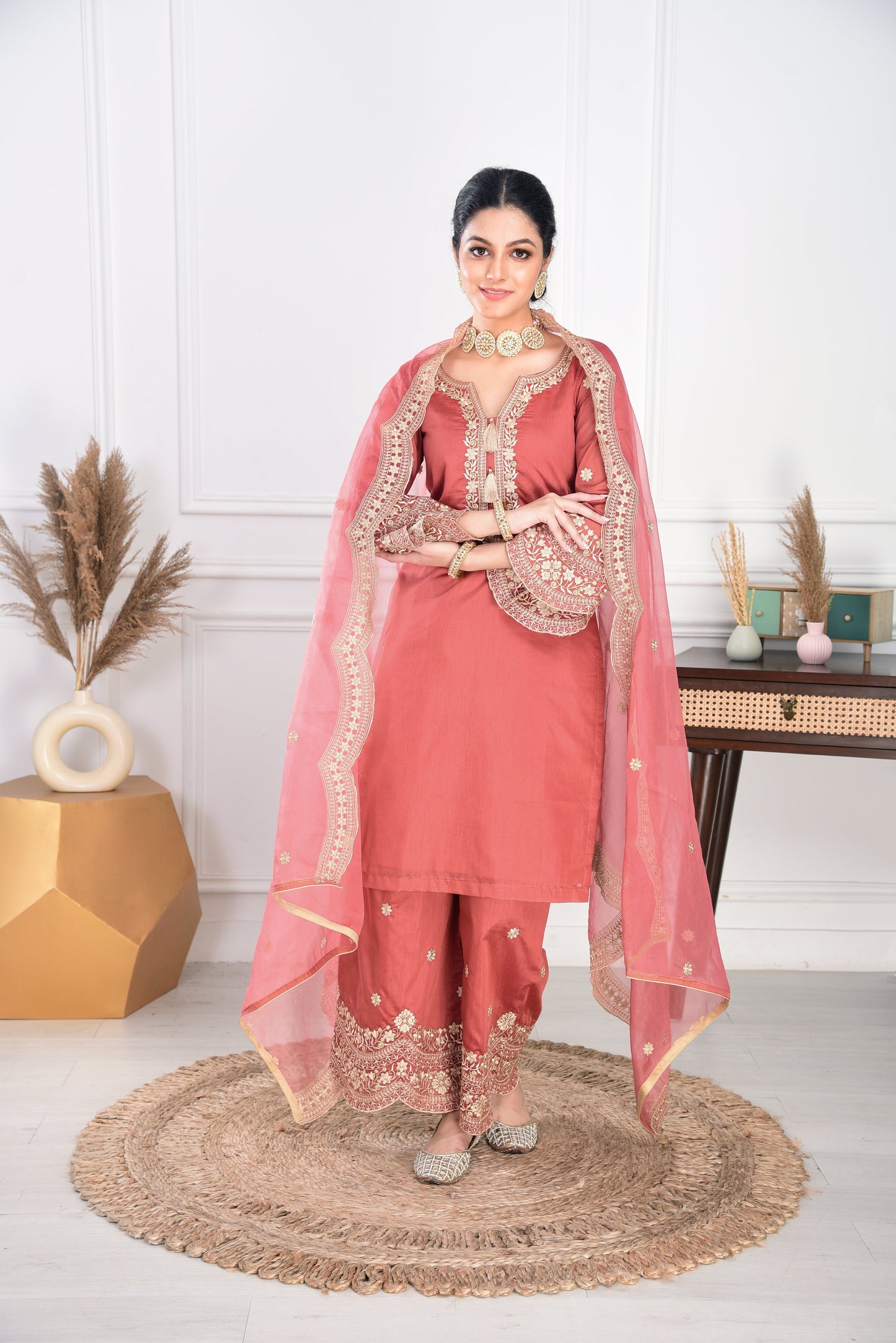 Ria Malhotra in Rust Chanderi Silk Suit Set