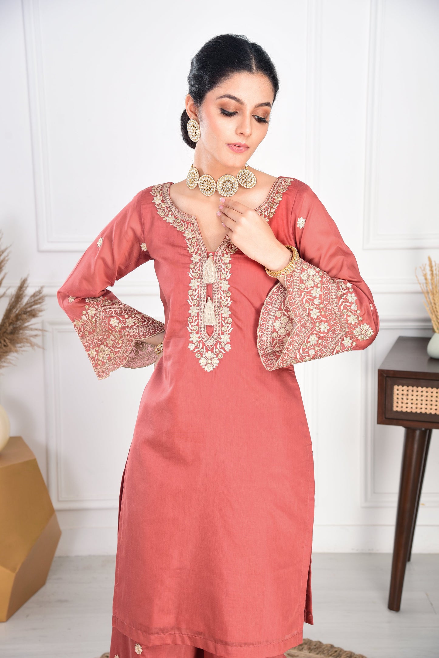 Ria Malhotra in Rust Chanderi Silk Suit Set