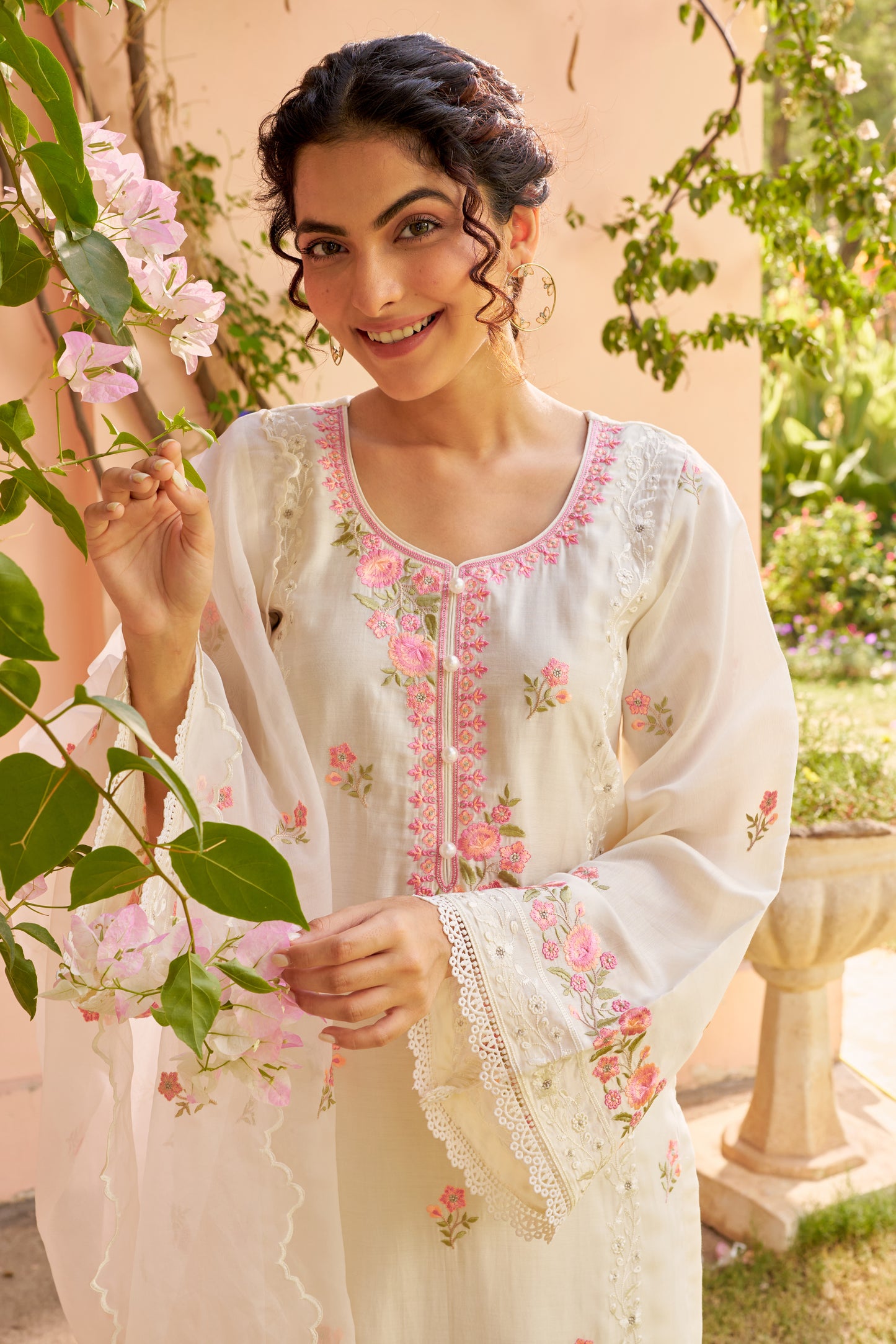Ria Malhotra in Nalini - Ivory White Chanderi Embroidered Suit Set.