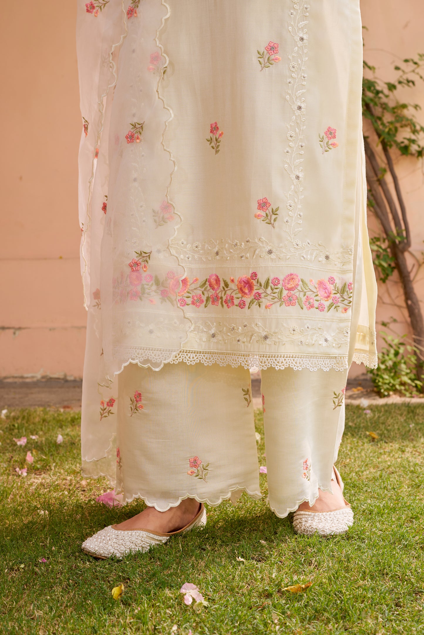 Ria Malhotra in Nalini - Ivory White Chanderi Embroidered Suit Set.