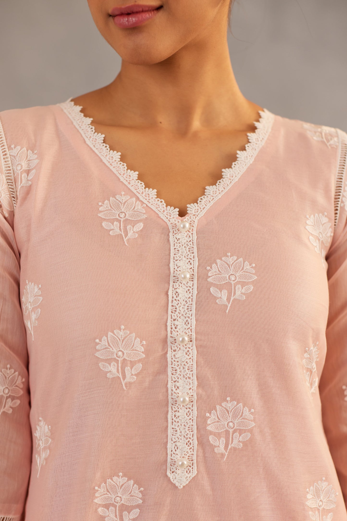 Dhirti Mehra in Gulmohar - Peach Embroidered Suit Set