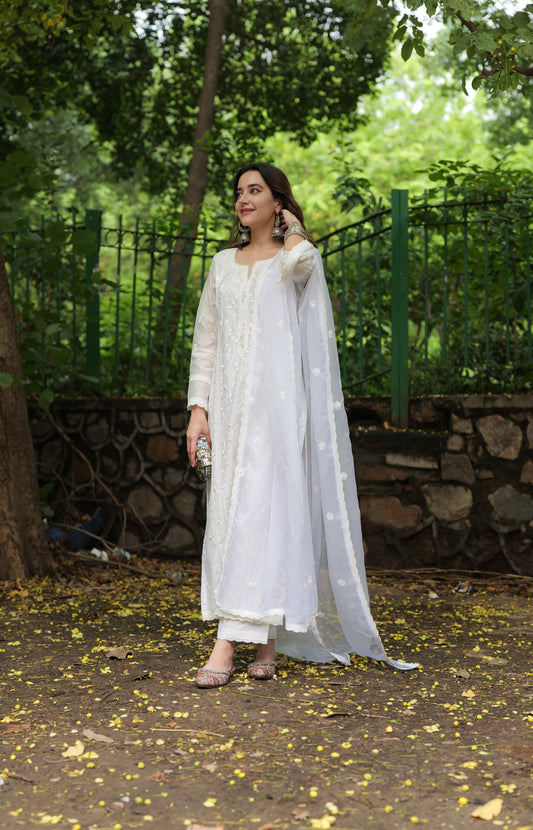 Komal Kapoor in Motiya - Egg White Chanderi Embroidered Suit Set.