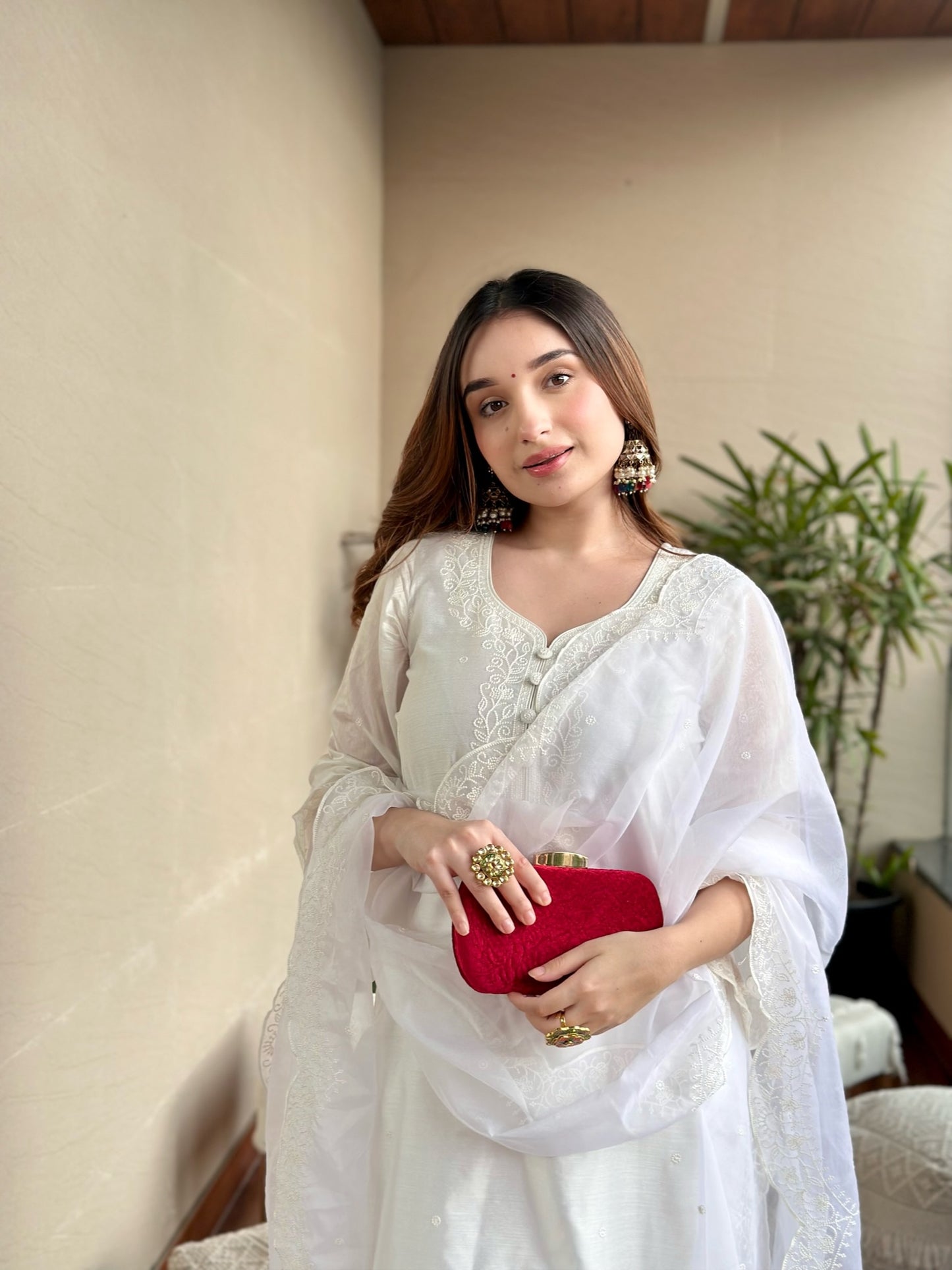 Tanya Sharma in Juhi - Egg White Embroidered Suit Set.