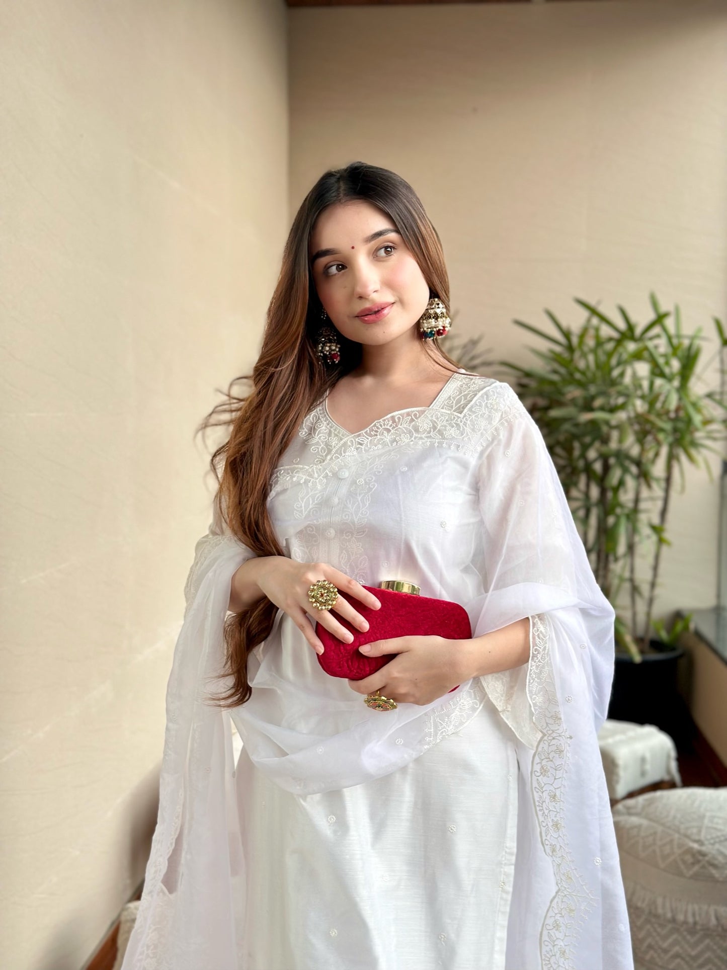 Tanya Sharma in Juhi - Egg White Embroidered Suit Set.