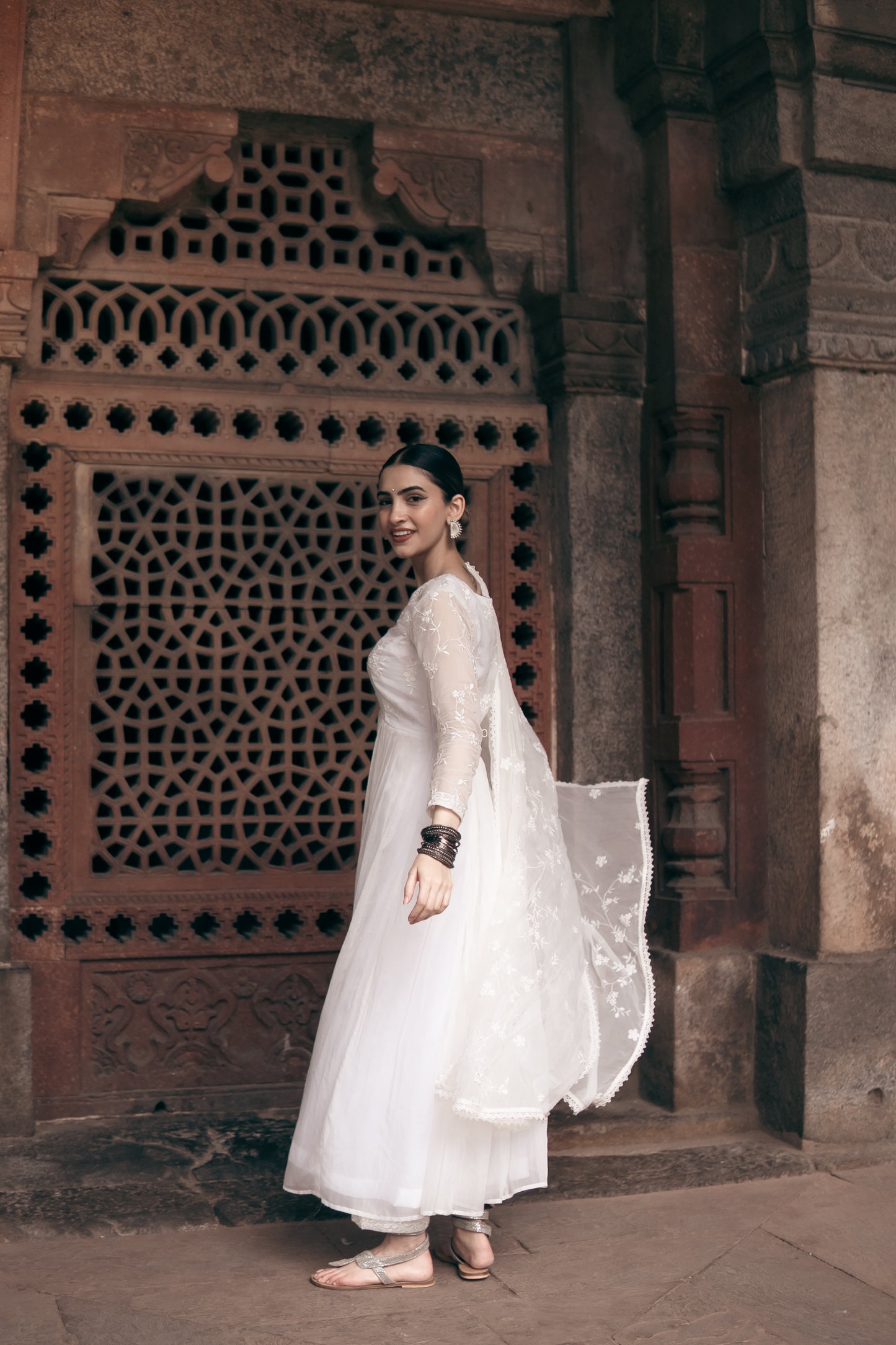 Shreya Lakhani in Aseem Ivory White Embroidered Anarkali Gown Set
