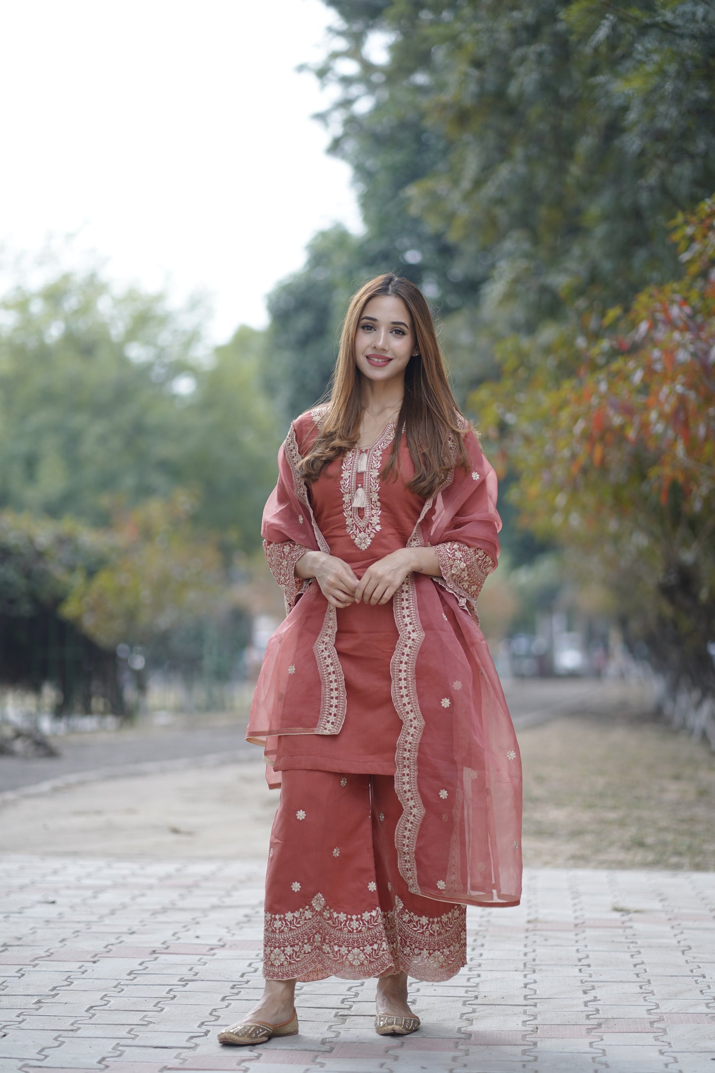 Ria Malhotra in Rust Chanderi Silk Suit Set