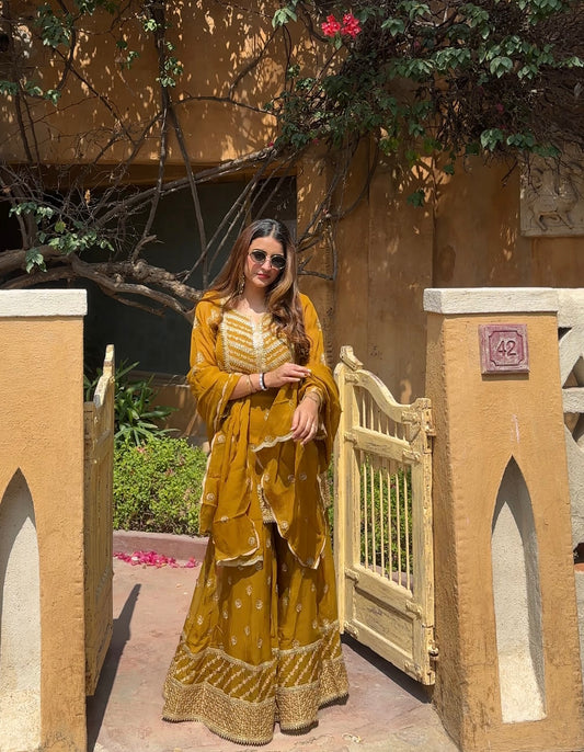 Simer Arora (@simeraroraa) in CHARVI - Yellow Organza Sharara Set