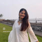 Krishna Mukherjee in in Aseem Ivory White Embroidered A-Line Suit Set