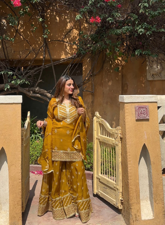 Simer Arora (@simeraroraa) in CHARVI - Yellow Organza Sharara Set