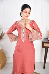 Ria Malhotra in Rust Chanderi Silk Suit Set