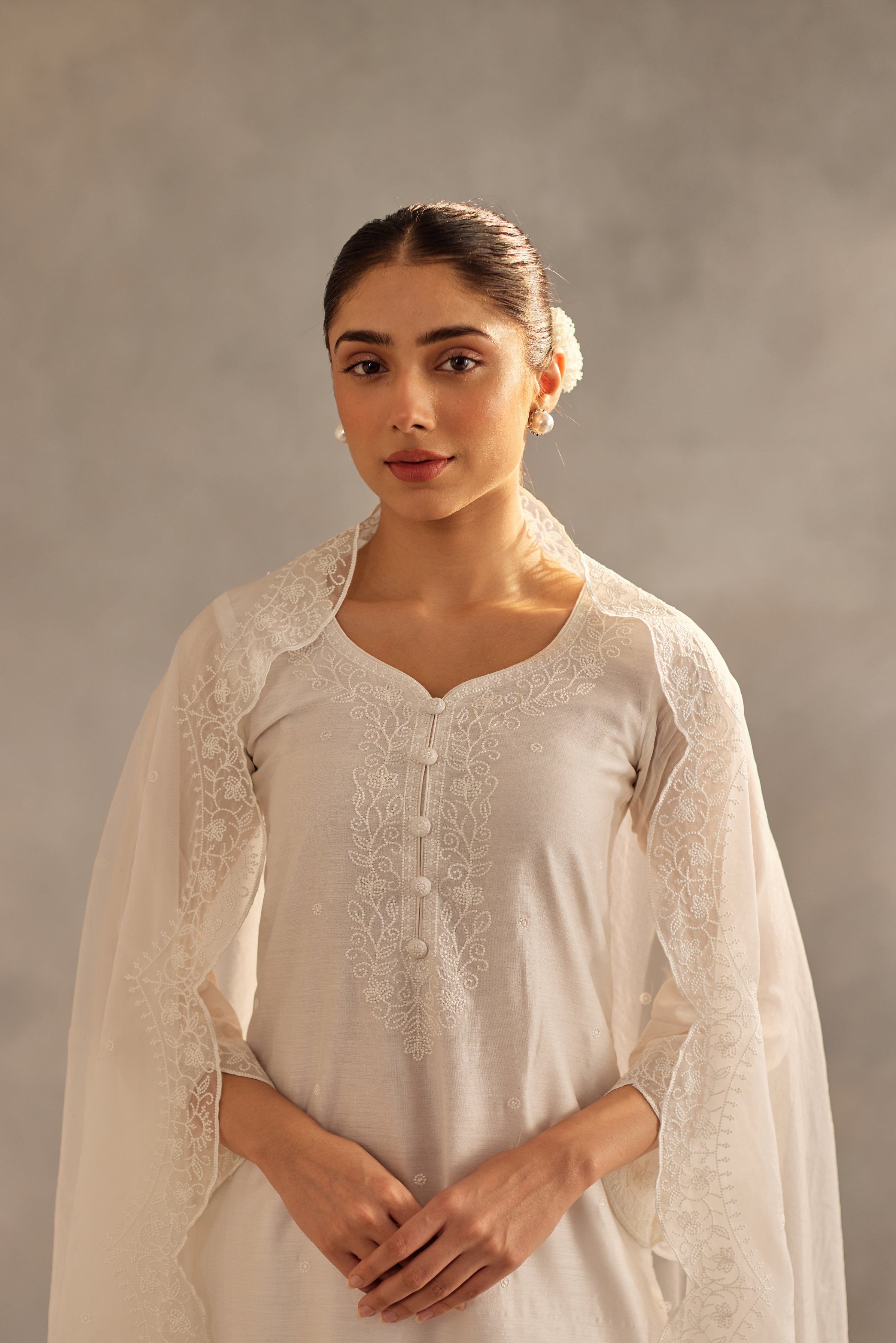 Tanya Sharma in Juhi - Egg White Embroidered Suit Set.