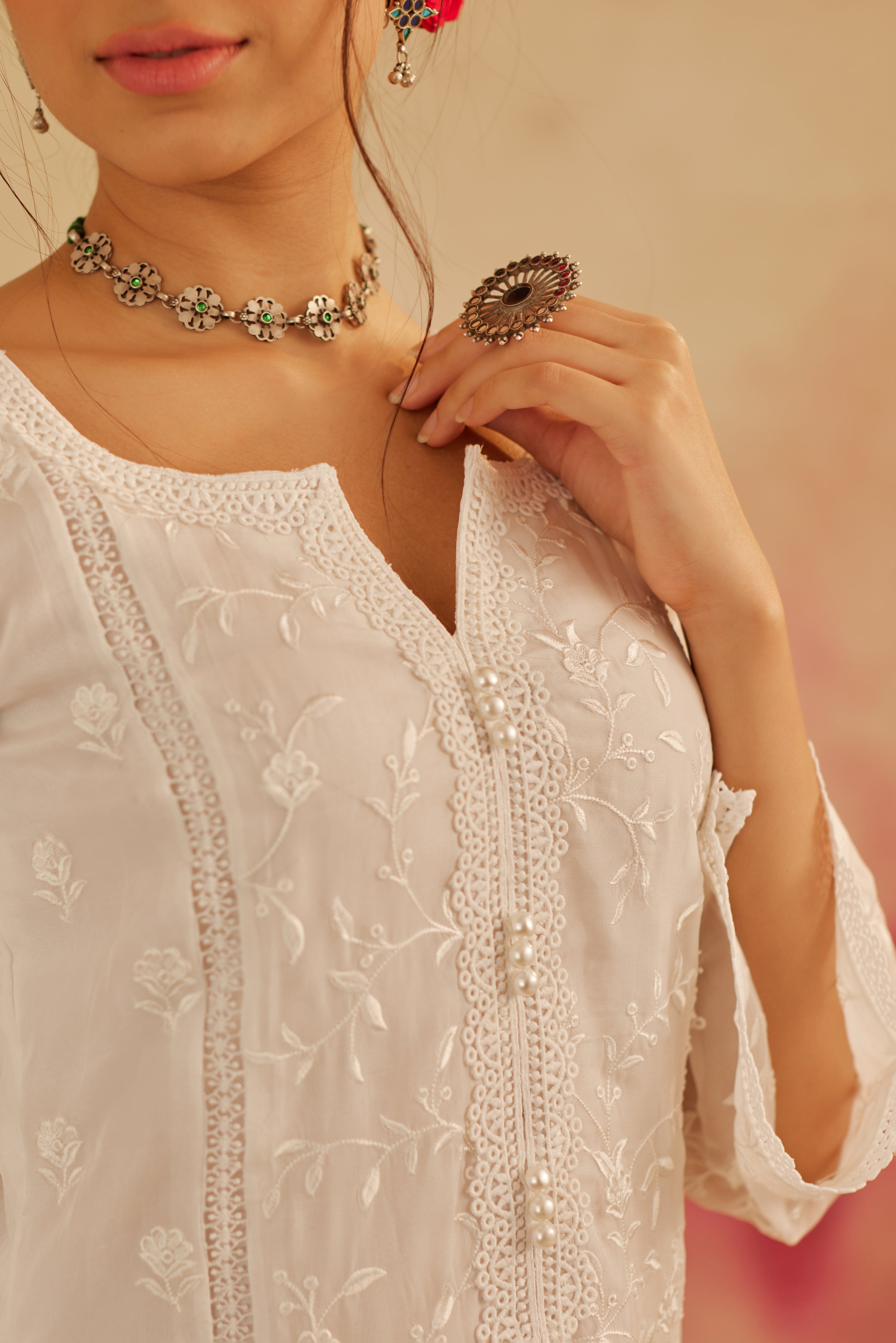 Krishna Mukherjee in in Aseem Ivory White Embroidered A-Line Suit Set