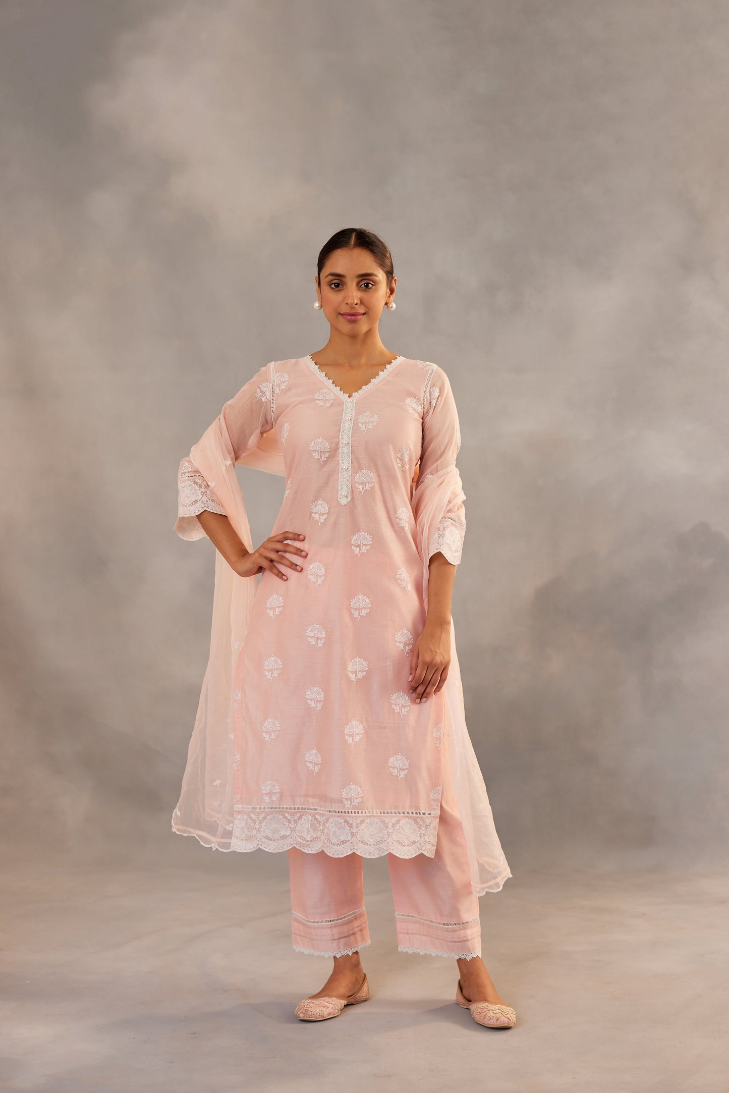 Dhirti Mehra in Gulmohar - Peach Embroidered Suit Set