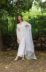 Komal Kapoor in Motiya - Egg White Chanderi Embroidered Suit Set.