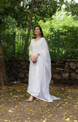 Komal Kapoor in Motiya - Egg White Chanderi Embroidered Suit Set.