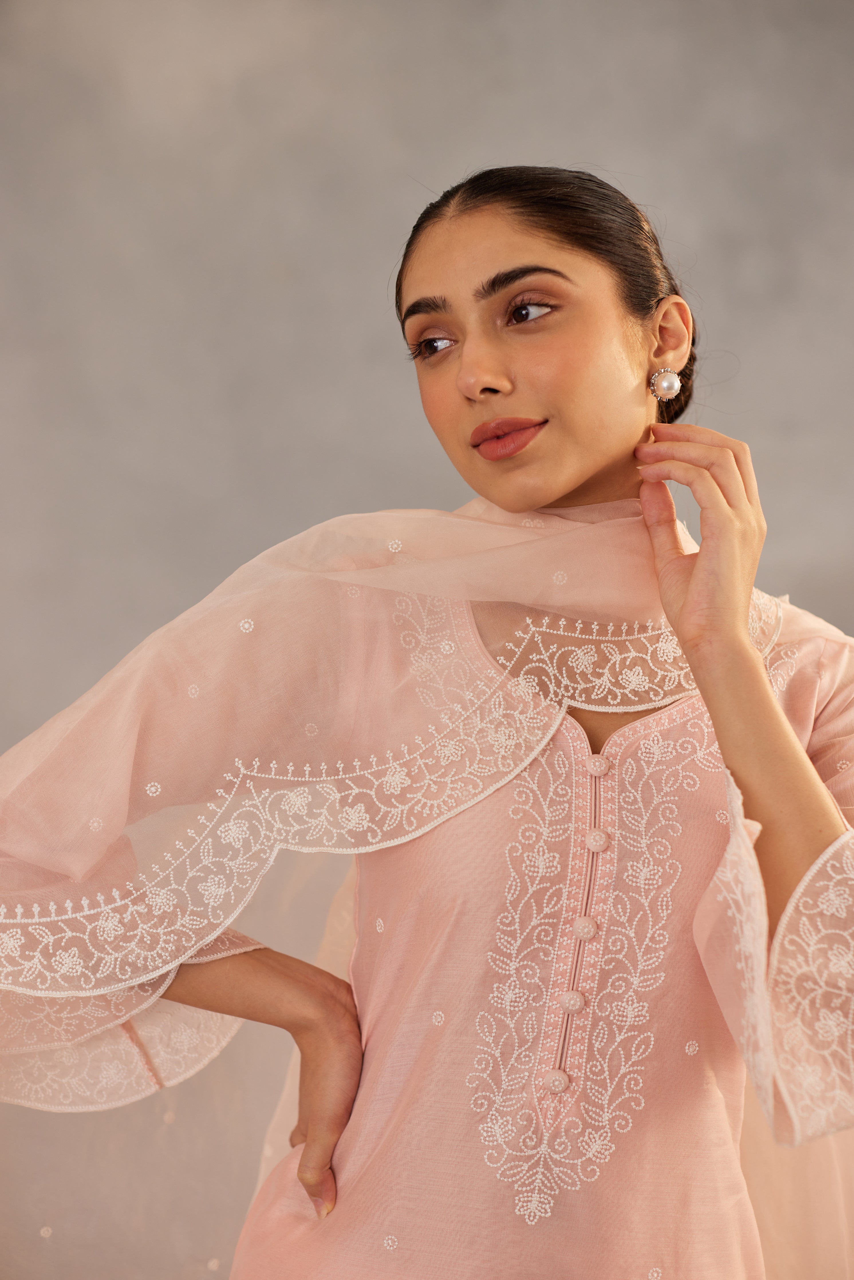 Diksha Juneja in Kamal - Peach Embroidered Suit Set.