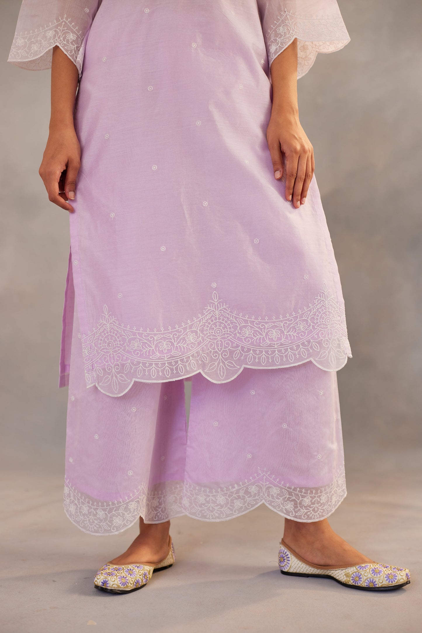 Arushi Sharma in Kesar - Lavender Embroidered Suit Set.