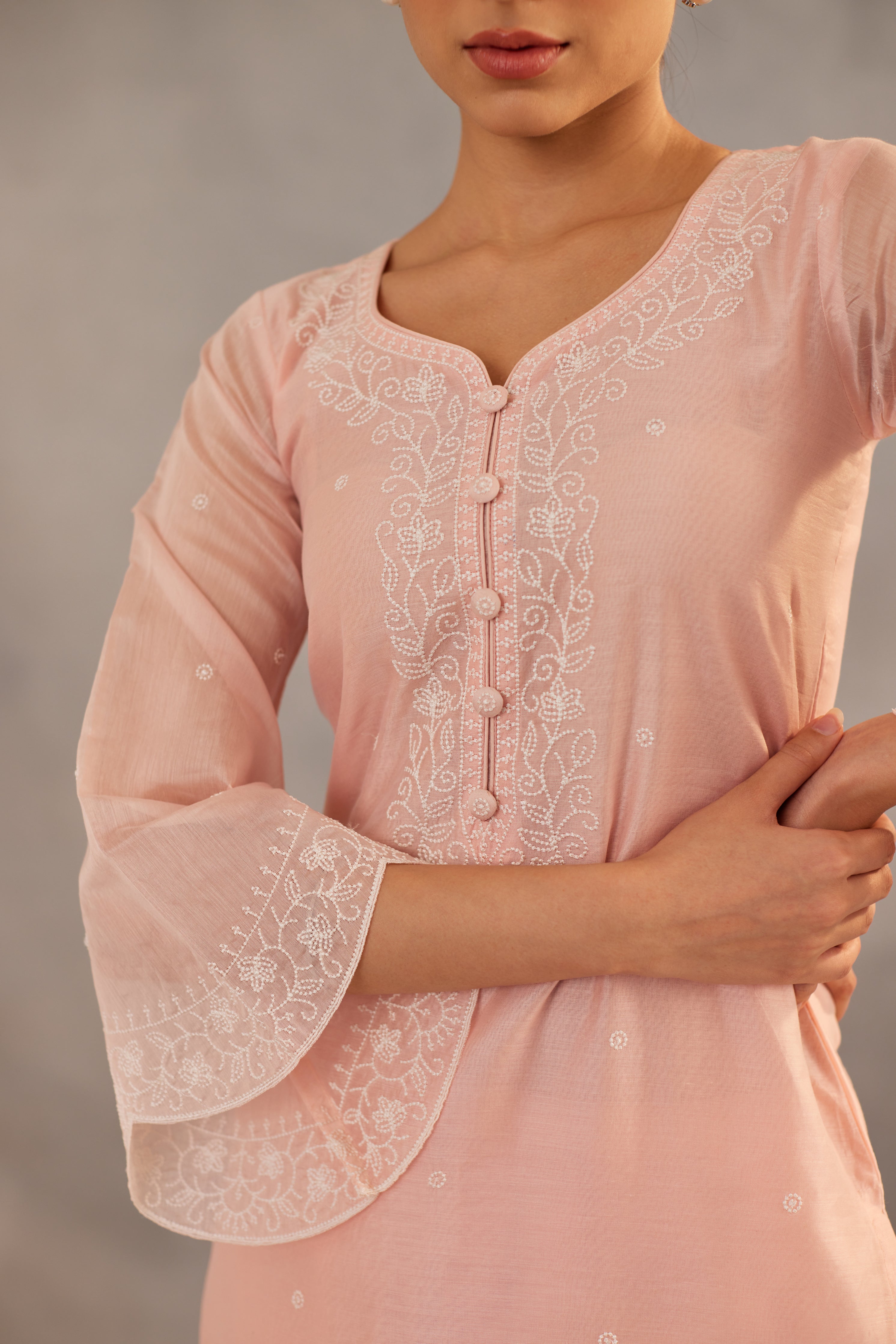 Diksha Juneja in Kamal - Peach Embroidered Suit Set.