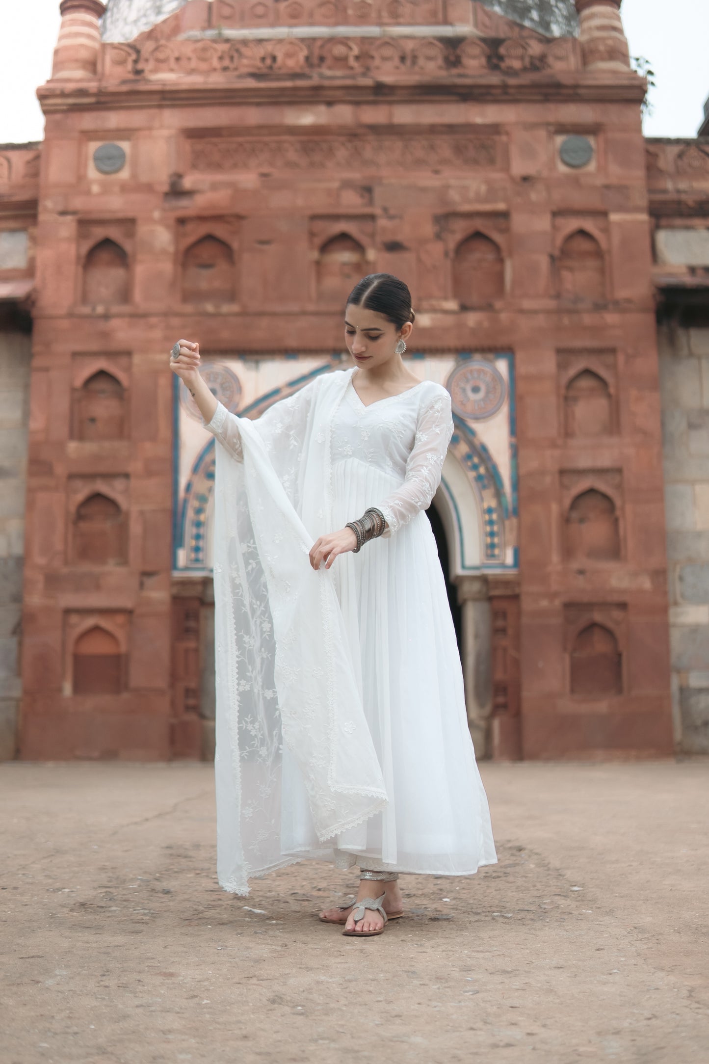 Shreya Lakhani in Aseem Ivory White Embroidered Anarkali Gown Set