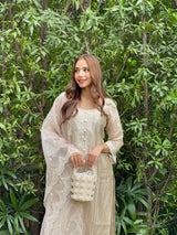 Ria Malhotra in Hazel Beige Chanderi Suit Set